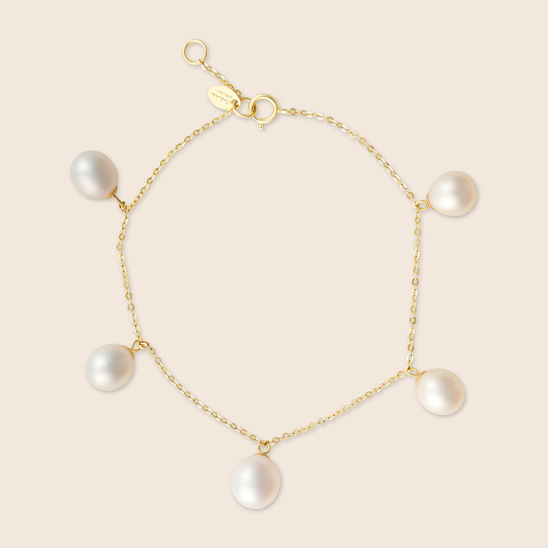 UEDEYGSZ3J_1 Lavita yellow gold oval dangling pearl bracelet - Image 1